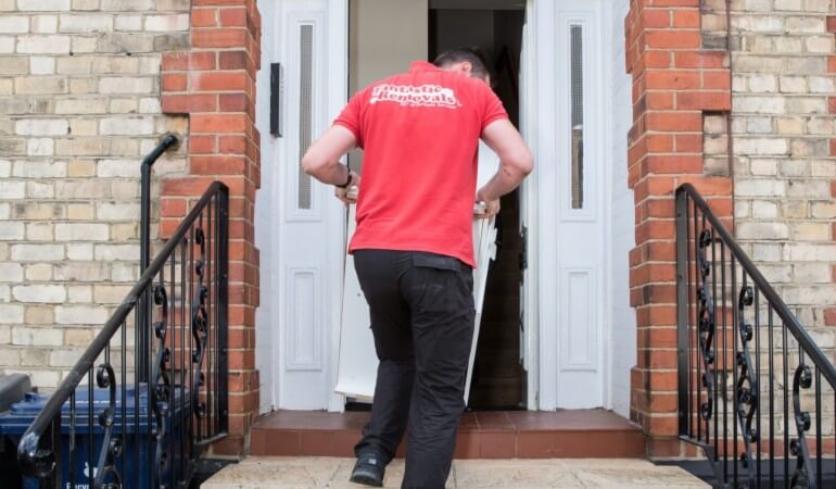 Removals expert handling a desk