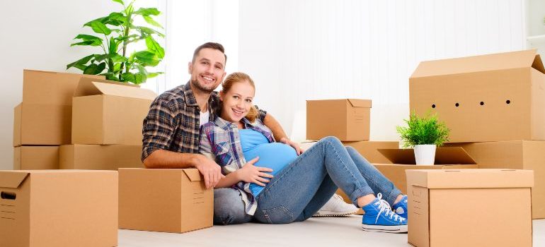 Family preparing to move house while expecting a baby