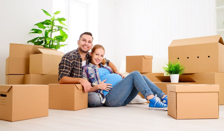 Family preparing to move house while expecting a baby