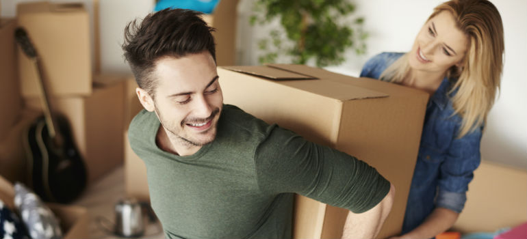 family moving a box