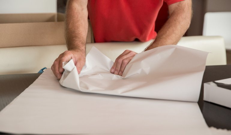 packing dishes with packing paper