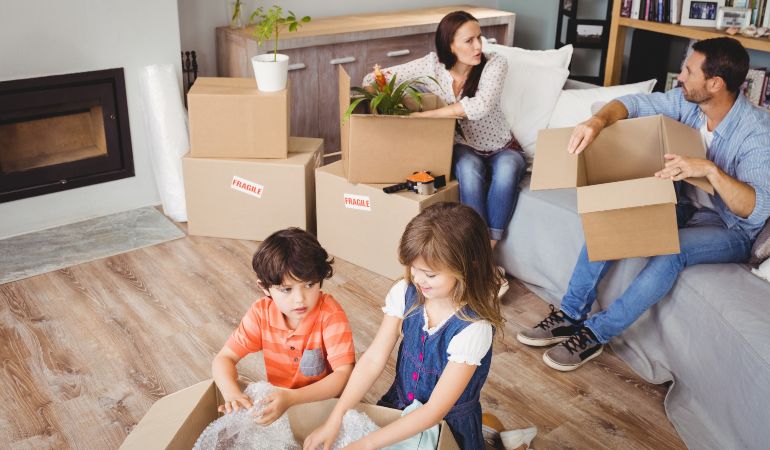 Family with kids packing for a move