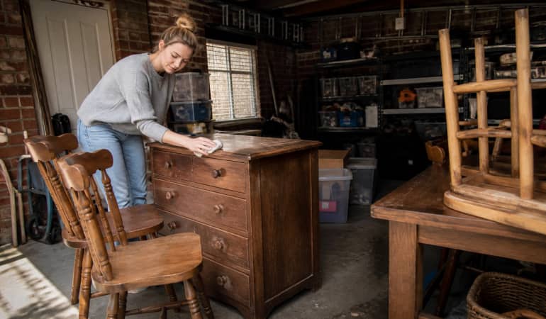 Illustration representing storing wooden furniture in garage